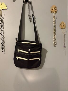 Sherpani Black Crossbody Bag with Cream Zippers - Women